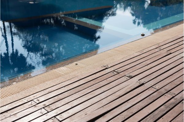 Pool Deck with Sign of Damage - Thornton Deck Builders, CO